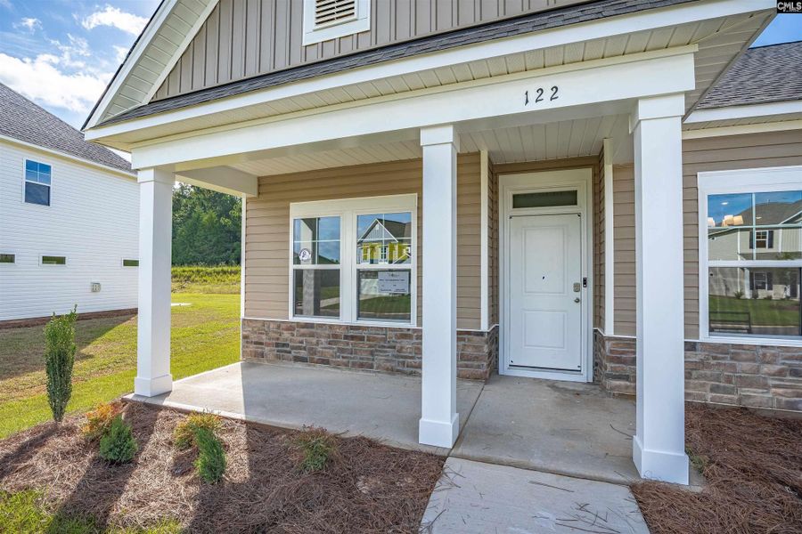 Exterior details and patio area of a home in Rolling Hills, Prosperity (Image 3).