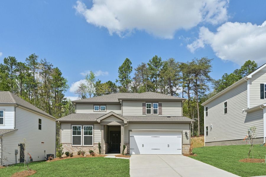 Front exterior of a new home in Cannon Manor, Kannapolis, NC, highlighting curb appeal (Image 1). Front exterior of a new home in Cannon Manor, Kannapolis, NC, highlighting curb appeal (Image 1).