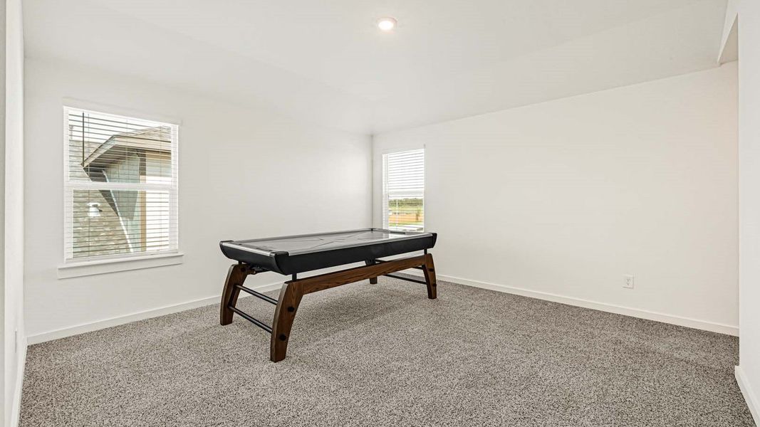 Representative furnished interior of a home built from the Jasmine by D.R. Horton in Holly Ridge, Rosenberg (Image 19).