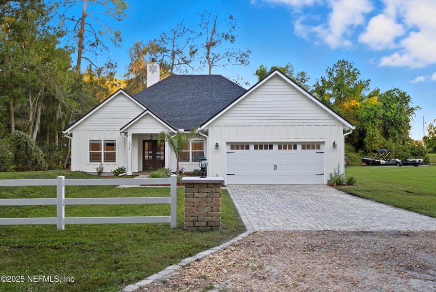 Front exterior of a new home in , Florahome, FL, highlighting curb appeal (Image 28).