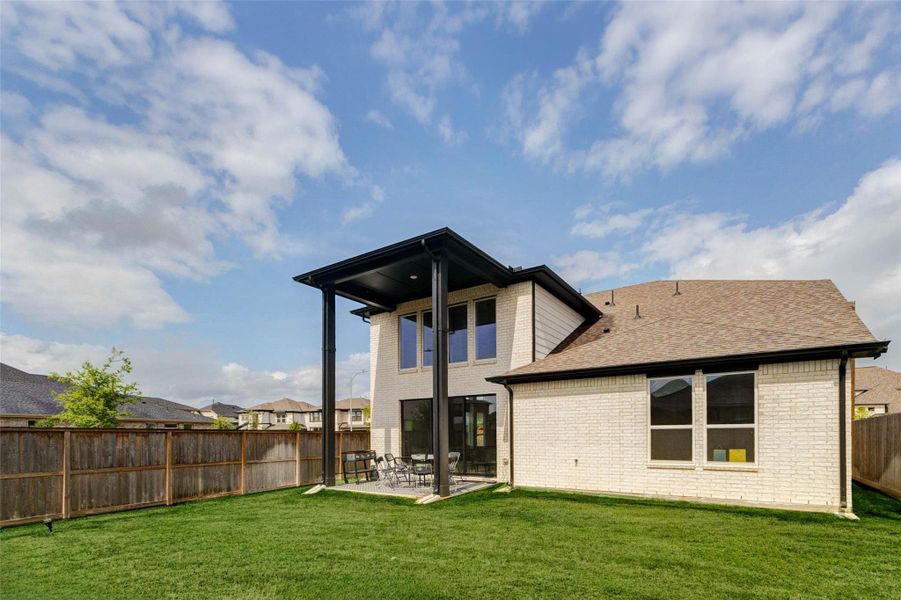 Exterior details and patio area of a home in , Richmond (Image 26).