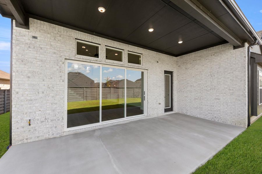 Exterior details and patio area of a home in Discovery Collection at Union Park, Little Elm (Image 3). Exterior details and patio area of a home in Discovery Collection at Union Park, Little Elm (Image 3).