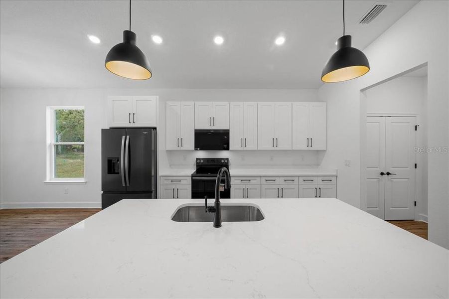 Furnished interior view inside a new home in , Weeki Wachee (Image 7).
