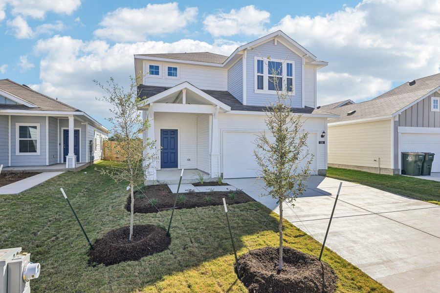 Front exterior of a new home in Cascade, Liberty Hill, TX, highlighting curb appeal (Image 21).
