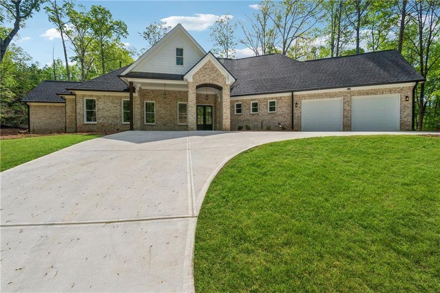 Front exterior of a new home in , Gainesville, GA, highlighting curb appeal (Image 28). Front exterior of a new home in , Gainesville, GA, highlighting curb appeal (Image 28).