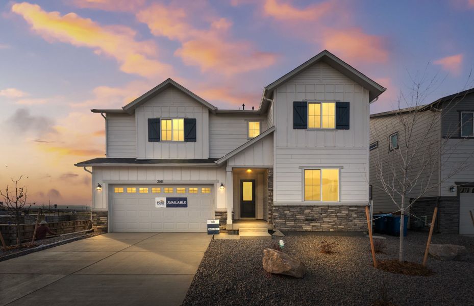 Front exterior of a new home in Harvest Crossing, Aurora, CO, highlighting curb appeal (Image 2). Front exterior of a new home in Harvest Crossing, Aurora, CO, highlighting curb appeal (Image 2).