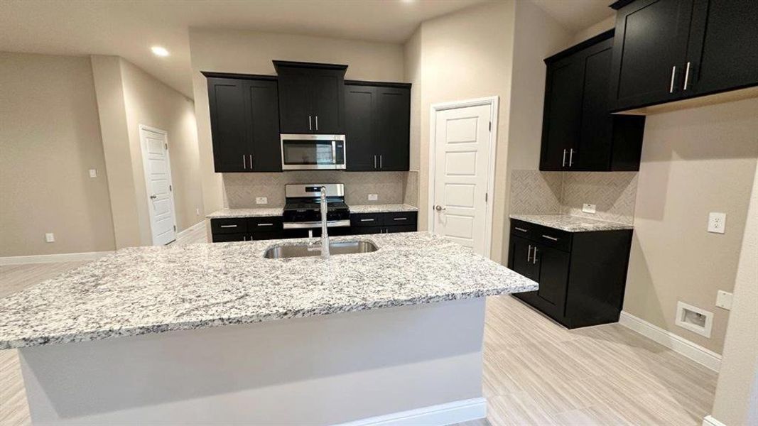 Furnished interior view inside a new home in Rock Creek Ranch, Fort Worth (Image 8). Furnished interior view inside a new home in Rock Creek Ranch, Fort Worth (Image 8).