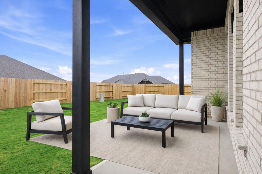 Exterior details and patio area of a home in Wildrye, Waller (Image 4).