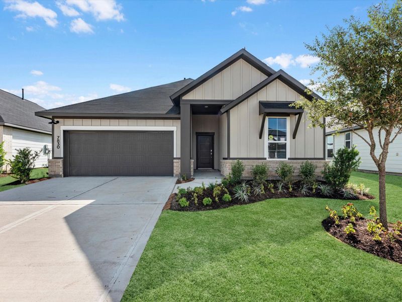 Front exterior of a new home in Mason Woods, Cypress, TX, highlighting curb appeal (Image 2). Front exterior of a new home in Mason Woods, Cypress, TX, highlighting curb appeal (Image 2).
