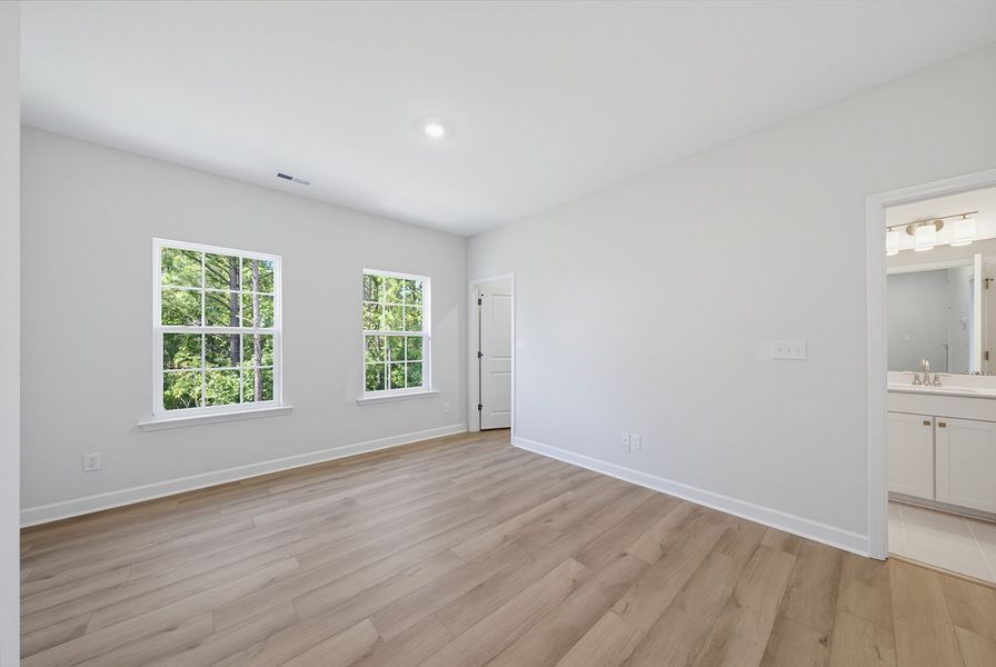 Spacious, unfurnished interior of a new home in Sweetbrier, Durham (Image 29).