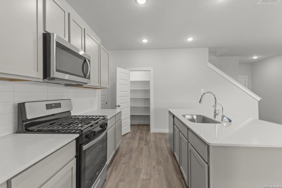 Furnished interior view inside a new home in Hacienda, San Antonio (Image 6).