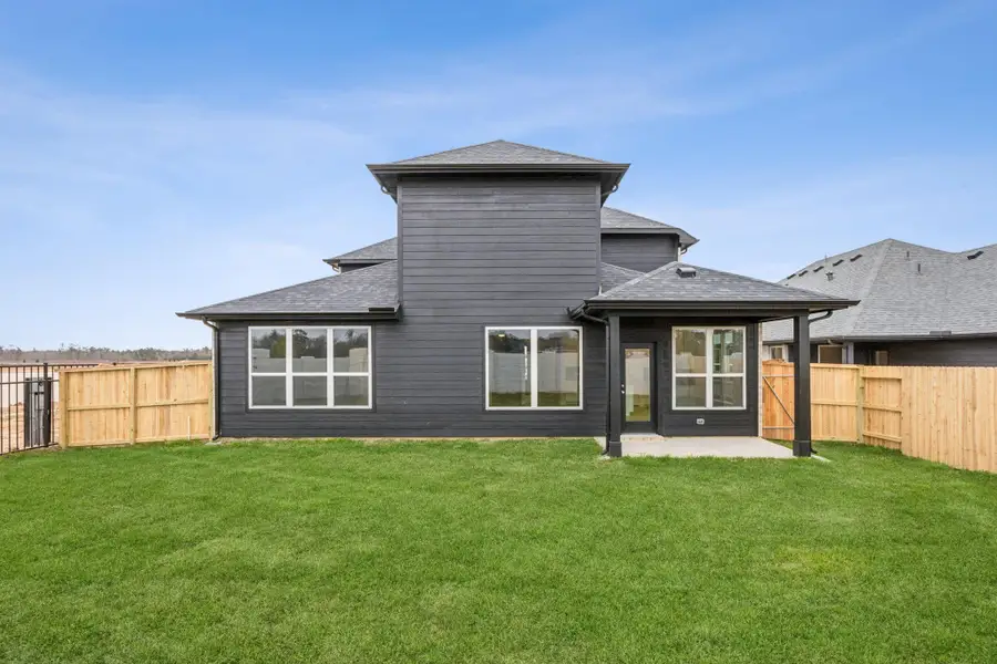 Exterior details and patio area of a home in Saint Tropez, Huffman (Image 3).