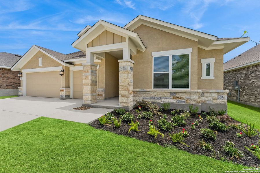 Front exterior of a new home in Davis Ranch 60', San Antonio, TX, highlighting curb appeal (Image 19). Front exterior of a new home in Davis Ranch 60', San Antonio, TX, highlighting curb appeal (Image 19).