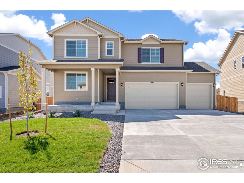 Front exterior of a new home in Northridge Estates, Greeley, CO, highlighting curb appeal (Image 16). Front exterior of a new home in Northridge Estates, Greeley, CO, highlighting curb appeal (Image 16).