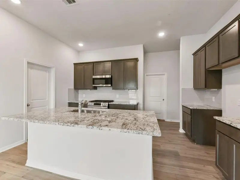 Furnished interior view inside a new home in Windmill Estates, Magnolia (Image 5). Furnished interior view inside a new home in Windmill Estates, Magnolia (Image 5).