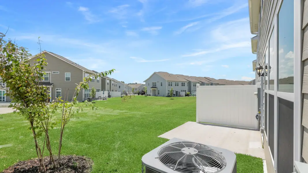 Exterior details and patio area of a home in The Townes at Stonecrest, Hendersonville (Image 3).