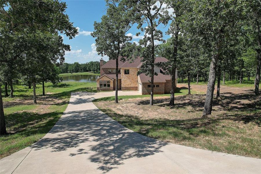 Front exterior of a new home in , Malakoff, TX, highlighting curb appeal (Image 2). Front exterior of a new home in , Malakoff, TX, highlighting curb appeal (Image 2).