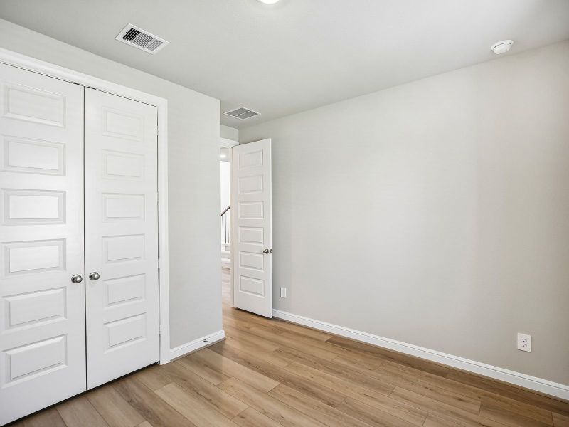Spacious, unfurnished interior of a new home in Massey Oaks - Estate Series, Pearland (Image 15). Spacious, unfurnished interior of a new home in Massey Oaks - Estate Series, Pearland (Image 15).