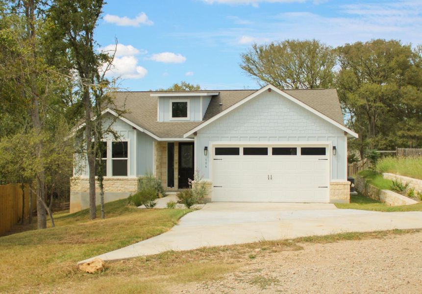 Front exterior of a new home in , Bastrop, TX, highlighting curb appeal (Image 18). Front exterior of a new home in , Bastrop, TX, highlighting curb appeal (Image 18).