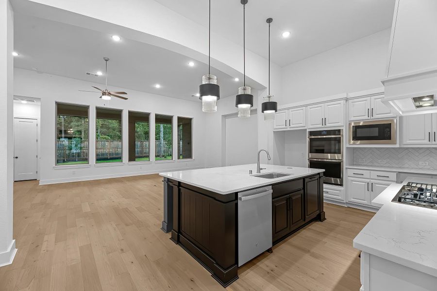 The kitchen provides an open concept to the family room where natural light abounds! The kitchen provides an open concept to the family room where natural light abounds!