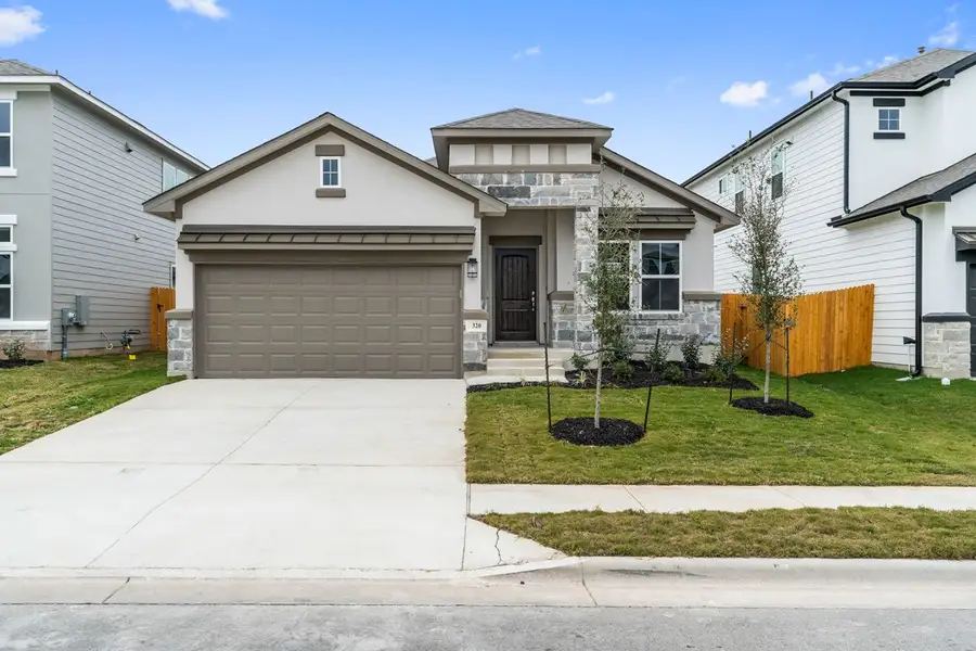 Representative exterior photo of a completed home built from the Willow 1872 SL by Saratoga Homes in Lakeside at Tessera on Lake Travis, Meadowlakes, TX (Image 2).