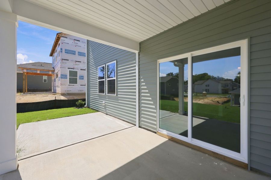 Exterior details and patio area of a home in Neill's Pointe, Angier (Image 3).