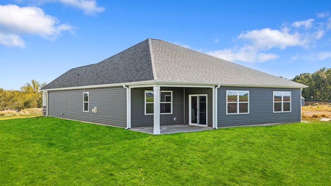 Exterior details and patio area of a home in Sherwood Gardens, Landrum (Image 17).