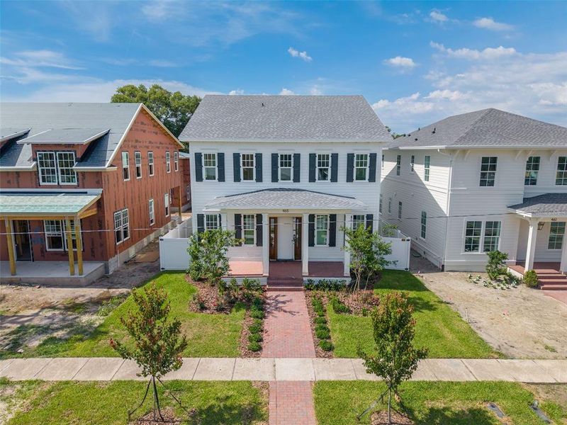 Front exterior of a new home in , St. Petersburg, FL, highlighting curb appeal (Image 6).