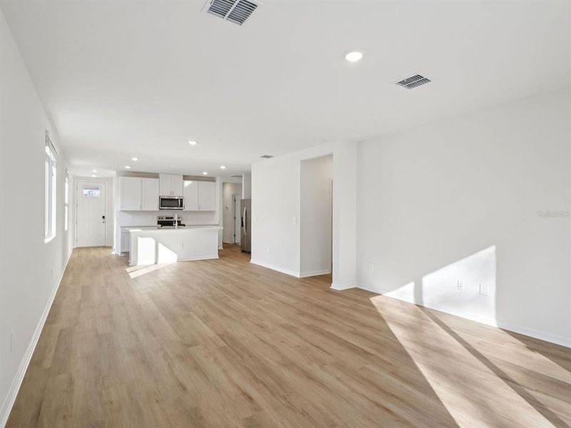 Spacious, unfurnished interior of a new home in Oakfield Trails - Premier Series, Parrish (Image 11).