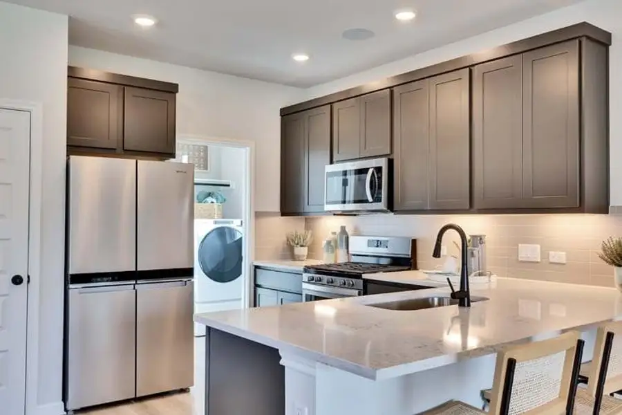 Furnished interior view inside a new home in The Hollows at Avery Centre, Round Rock (Image 10).