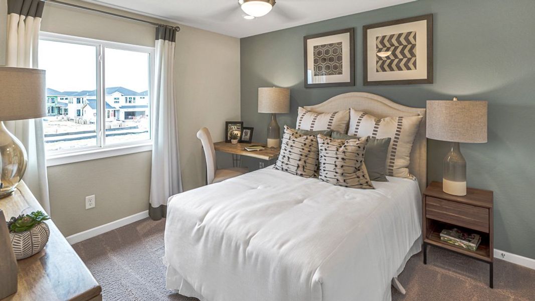 Representative furnished interior of a home built from the Portsmouth by Taylor Morrison in The Retreat at Harvest, Argyle (Image 15).