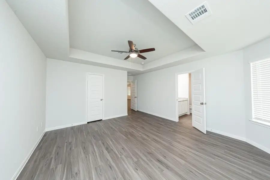 Spacious, unfurnished interior of a new home in River's Edge, Conroe (Image 11). Spacious, unfurnished interior of a new home in River's Edge, Conroe (Image 11).