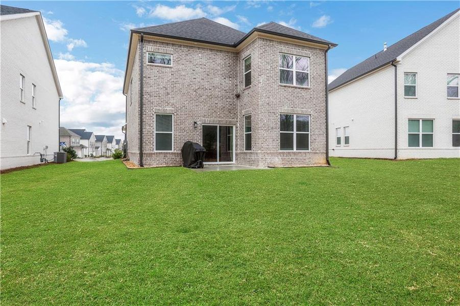 Exterior details and patio area of a home in Graystone Village, Grayson (Image 3). Exterior details and patio area of a home in Graystone Village, Grayson (Image 3).
