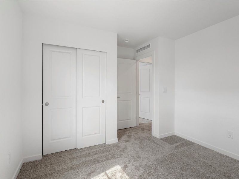 Spacious, unfurnished interior of a new home in The Hub at Virginia Village, Denver (Image 16).