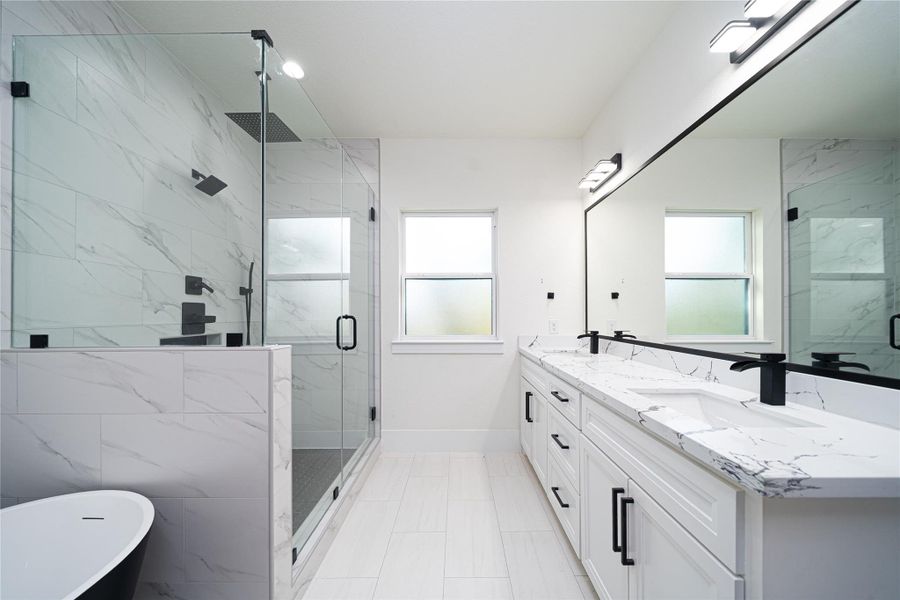 The primary en suite bathroom offers a true spa-like experience, featuring a relaxing soaking tub, a separate stand-up shower, and a double vanity with soft-close cabinets. Designed for complete privacy and comfort, this beautifully updated space delivers both luxury and practicality—an upgrade you’ll be glad you chose. The primary en suite bathroom offers a true spa-like experience, featuring a relaxing soaking tub, a separate stand-up shower, and a double vanity with soft-close cabinets. Designed for complete privacy and comfort, this beautifully updated space delivers both luxury and practicality—an upgrade you’ll be glad you chose.