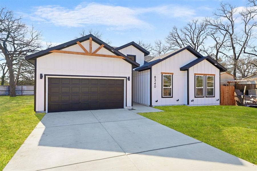 Front exterior of a new home in , Dallas, TX, highlighting curb appeal (Image 20).