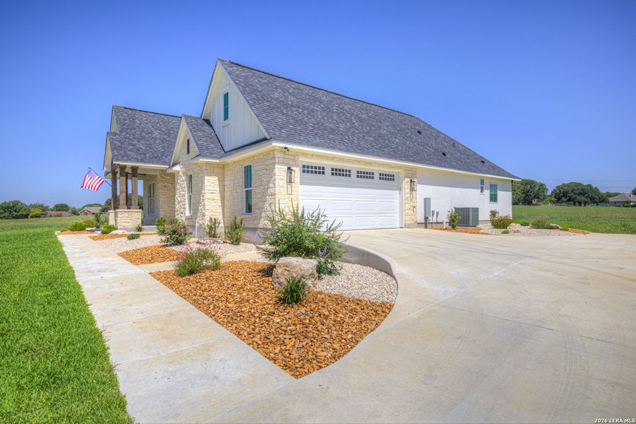 Front exterior of a new home in , Seguin, TX, highlighting curb appeal (Image 31).