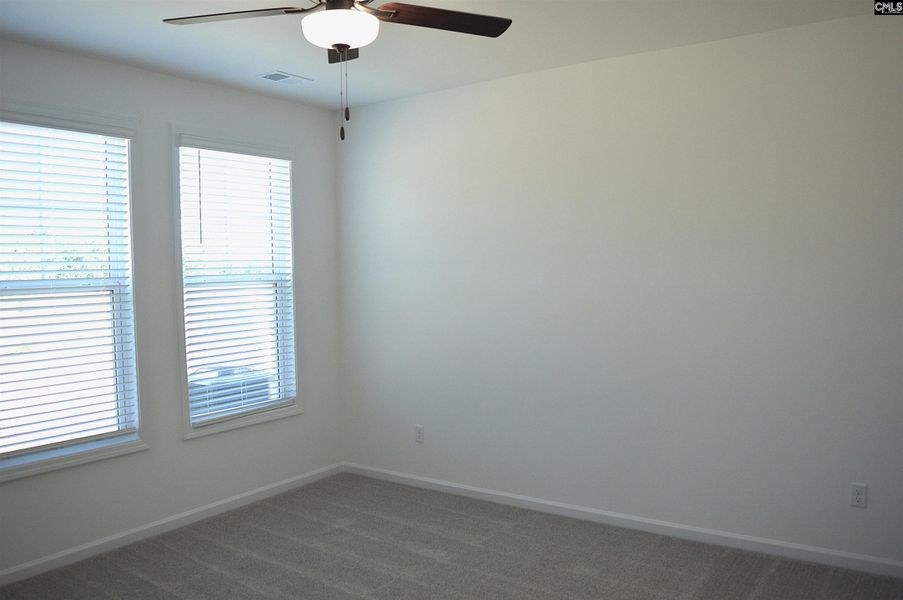 Spacious, unfurnished interior of a new home in Bickley Station, Irmo (Image 17).
