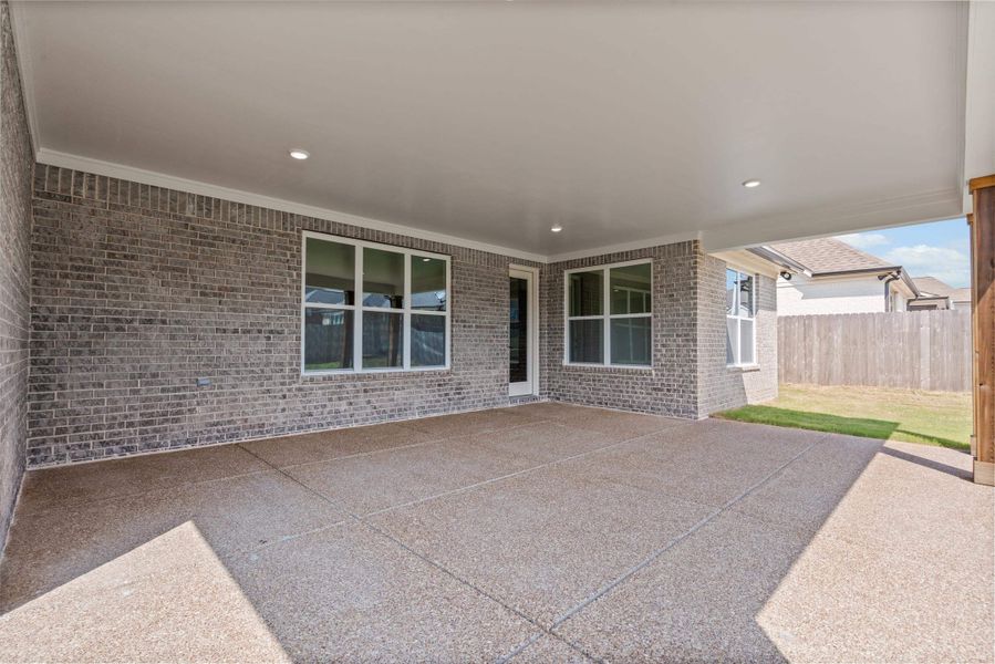 Exterior details and patio area of a home in White Oak, Arlington (Image 3). Exterior details and patio area of a home in White Oak, Arlington (Image 3).