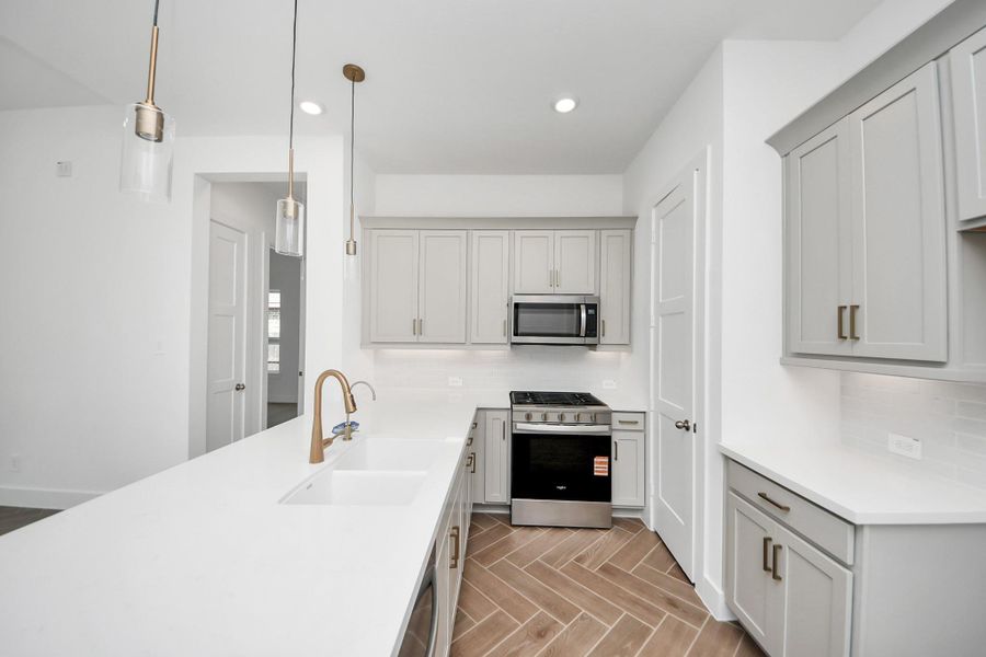 Furnished interior view inside a new home in Amira: Premier Collection, Tomball (Image 12).