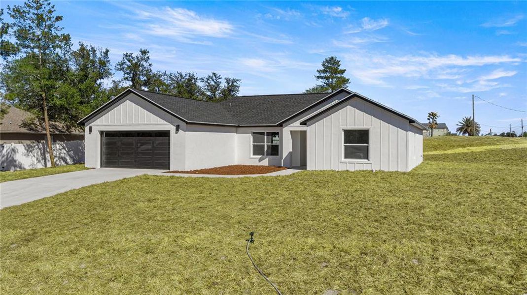 Front exterior of a new home in , Ocala, FL, highlighting curb appeal (Image 21).