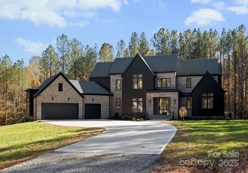 Front exterior of a new home in , Denver, NC, highlighting curb appeal (Image 1).
