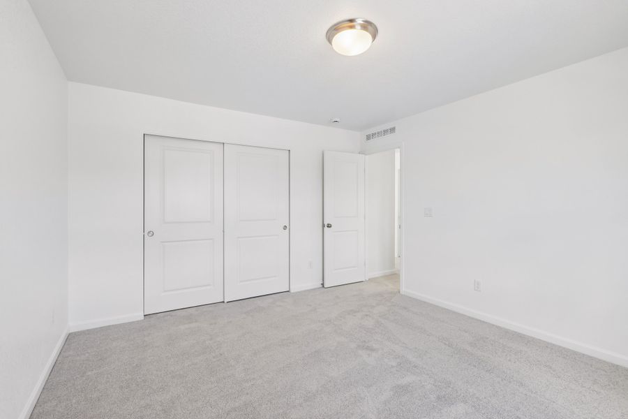 Spacious, unfurnished interior of a new home in The Town Collection at Independence, Elizabeth (Image 25).