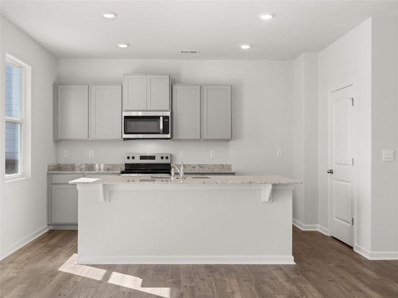 Furnished interior view inside a new home in Oaks at Cedar Grove, Fairburn (Image 13).