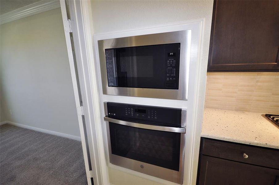 Built in self cleaning oven with a built in microwave above.