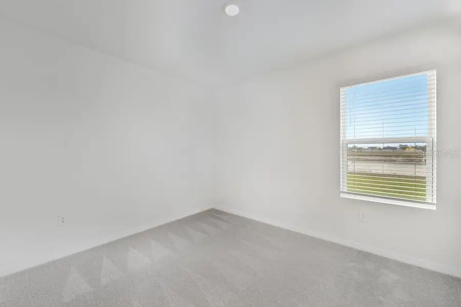 Spacious, unfurnished interior of a new home in Firethorn, Parrish (Image 24).