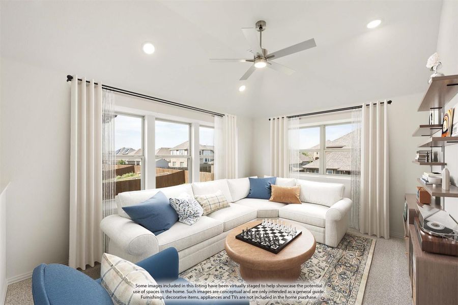 Living room with white sectional sofa, ceiling fan, and large windows with neighborhood views