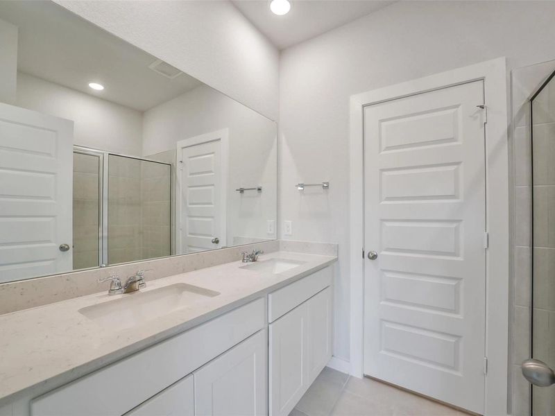 Furnished interior view inside a new home in Caney Creek Place, Conroe (Image 7).