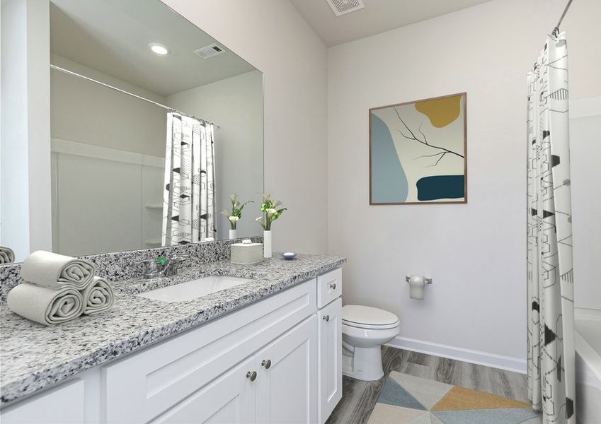 Get ready for your day in the master bathroom