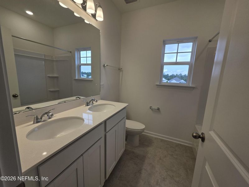 Furnished interior view inside a new home in Hyland Trail, Green Cove Springs (Image 8).